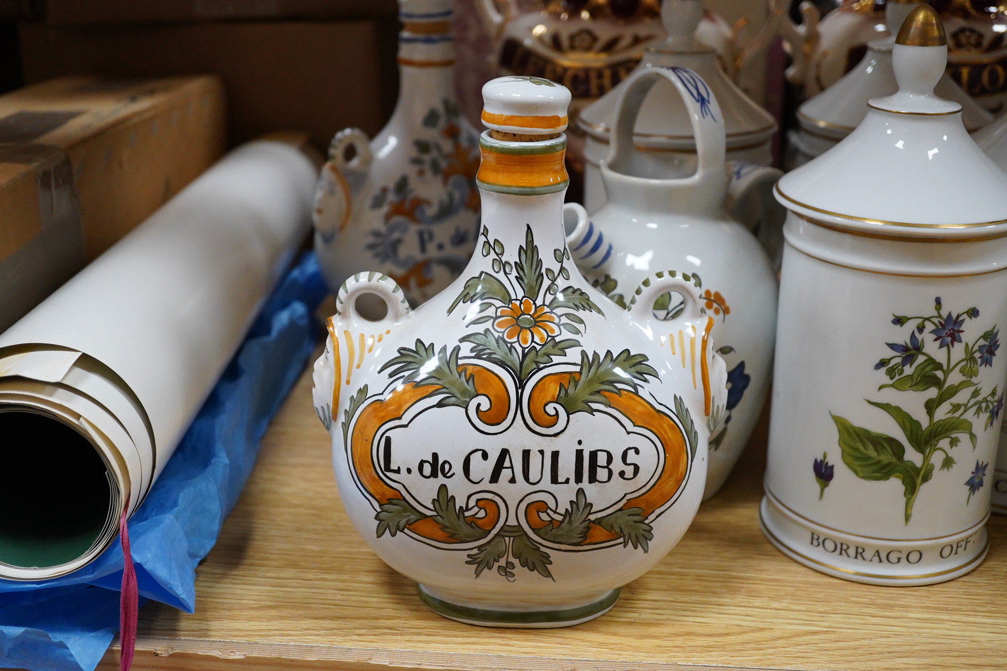 Six Italian faience Botanical apothecary jars and covers - 26cm high, two other 19th century style jars and three other related items.